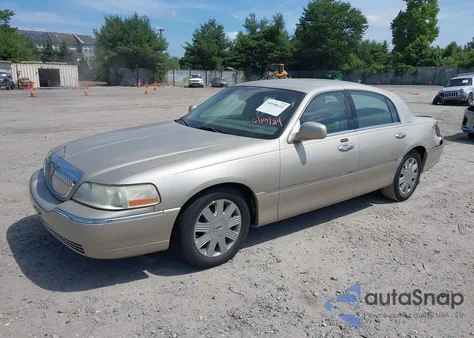 2004 Lincoln Town Car Ultimate из США, поврежденный, VIN 1LNHM83W14Y644745
